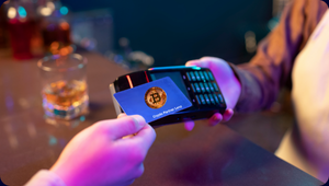 Payment with card and Bitcoin logo demonstrating CPLs Payment service to enable purchase with crypto 