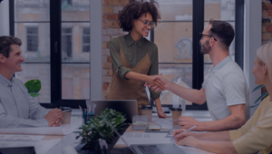 woman and men shaking hands in meeting demonstrating CPLs Actions to Coach Crypto Success